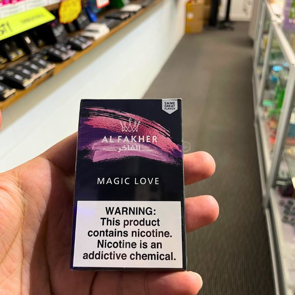 a box of al-fakher hookah flavor magic love